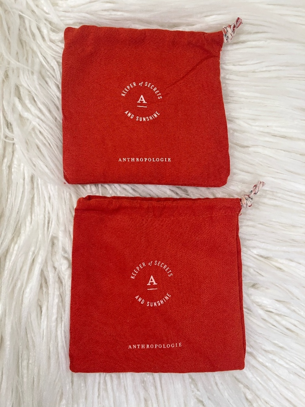Anthropologie "Set of too velvet drawstring pouches in coral" NWT